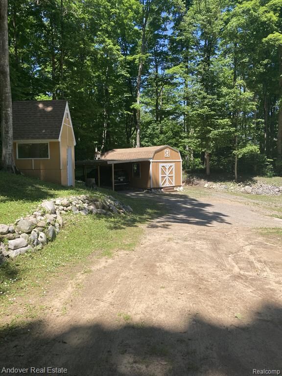 Property Photo: 1548 Sunterra Trail MI 49712 9025
