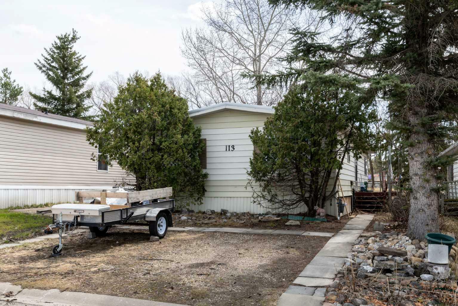 Property Photo: 113 Westwood Court AB T4G 1S2