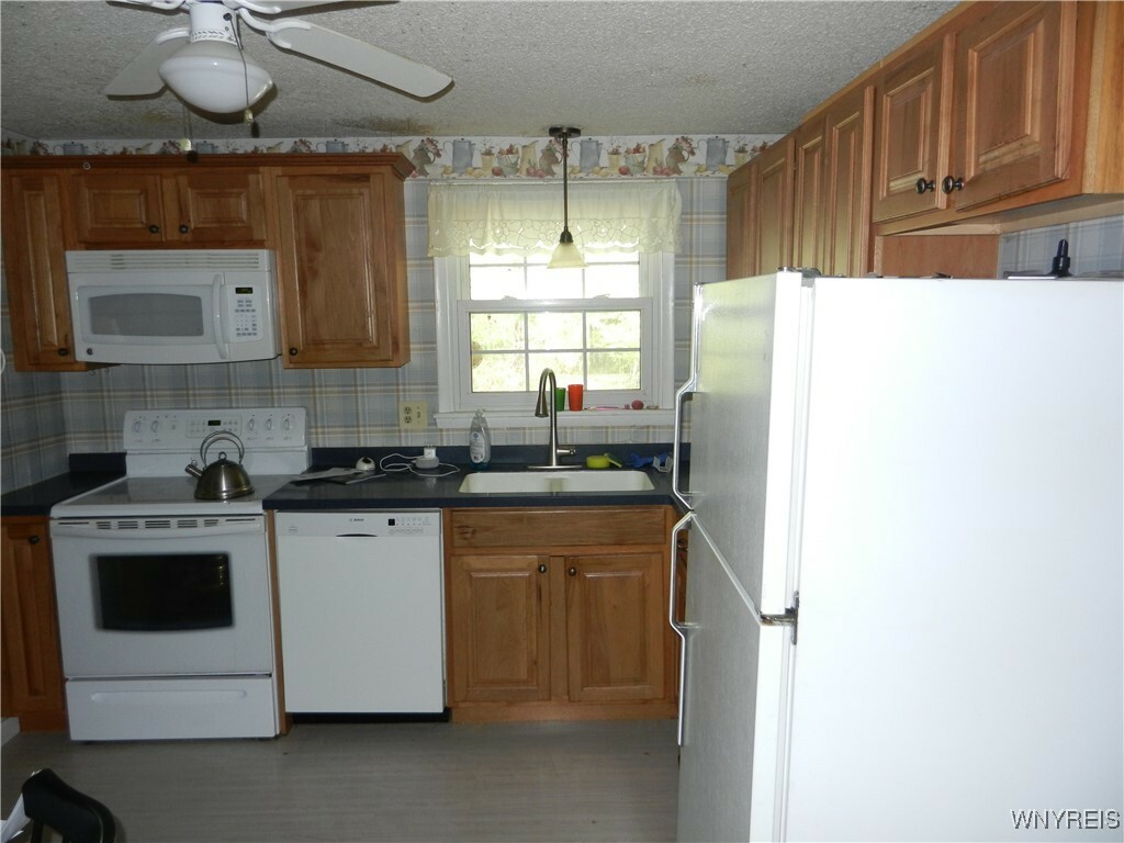 Property Photo: 5051 Overlook Point NY 14075
