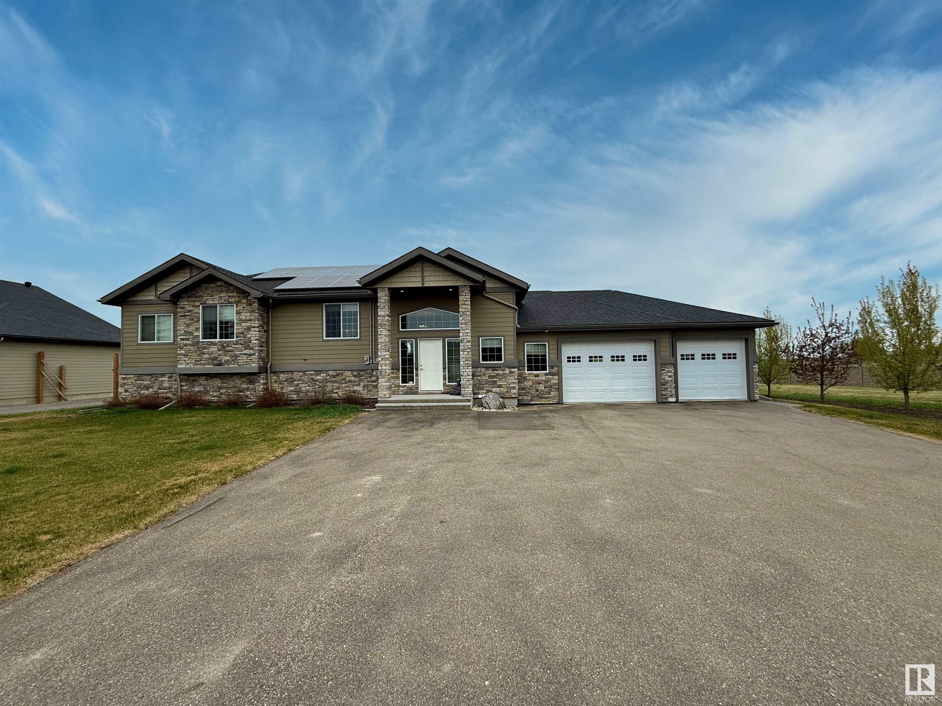 Property Photo: 101 46225 Twp Rd 612 AB T9N 2G8