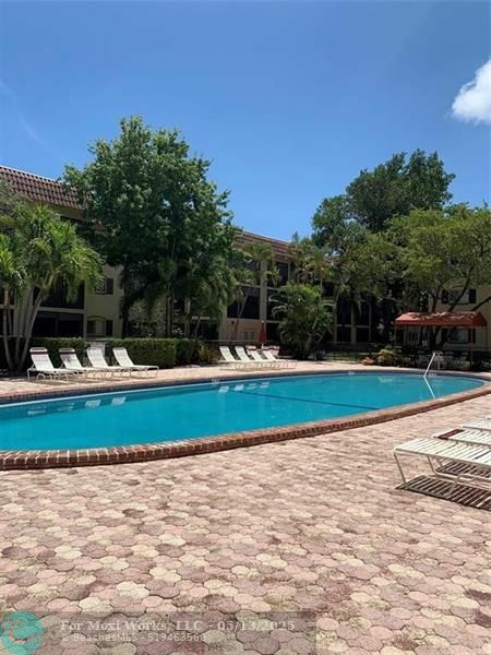 Property Photo: 251 S Cypress Rd 105 FL 33060
