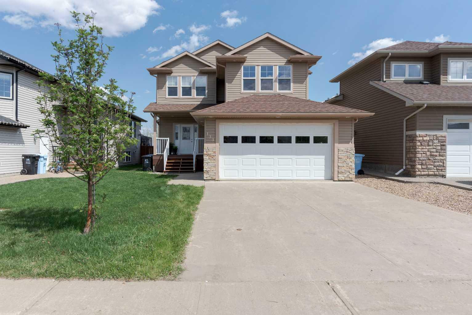 Property Photo: 133 Chestnut Way AB T9K 0M6