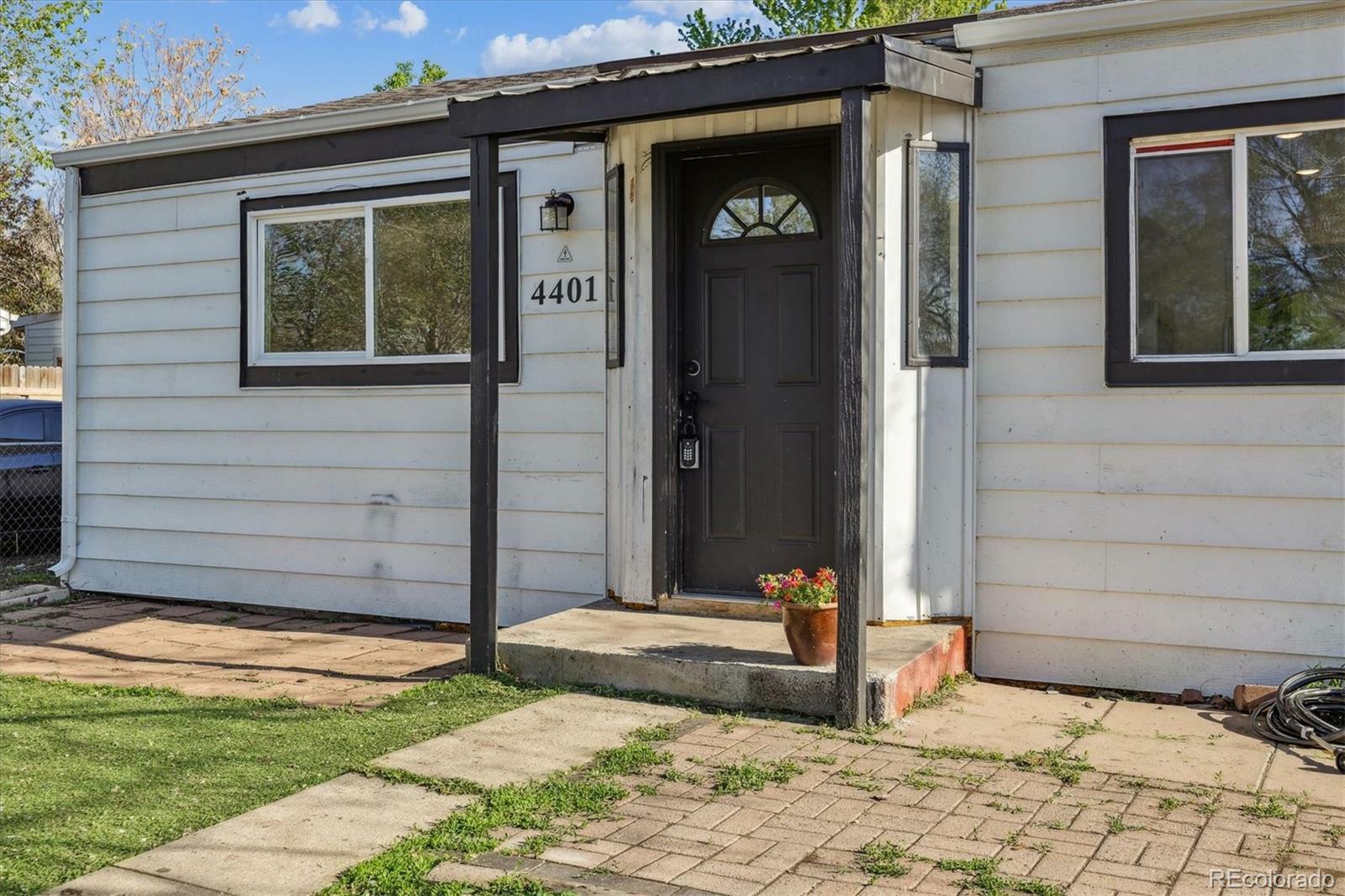 Property Photo: 4401 W Mississippi Avenue CO 80219