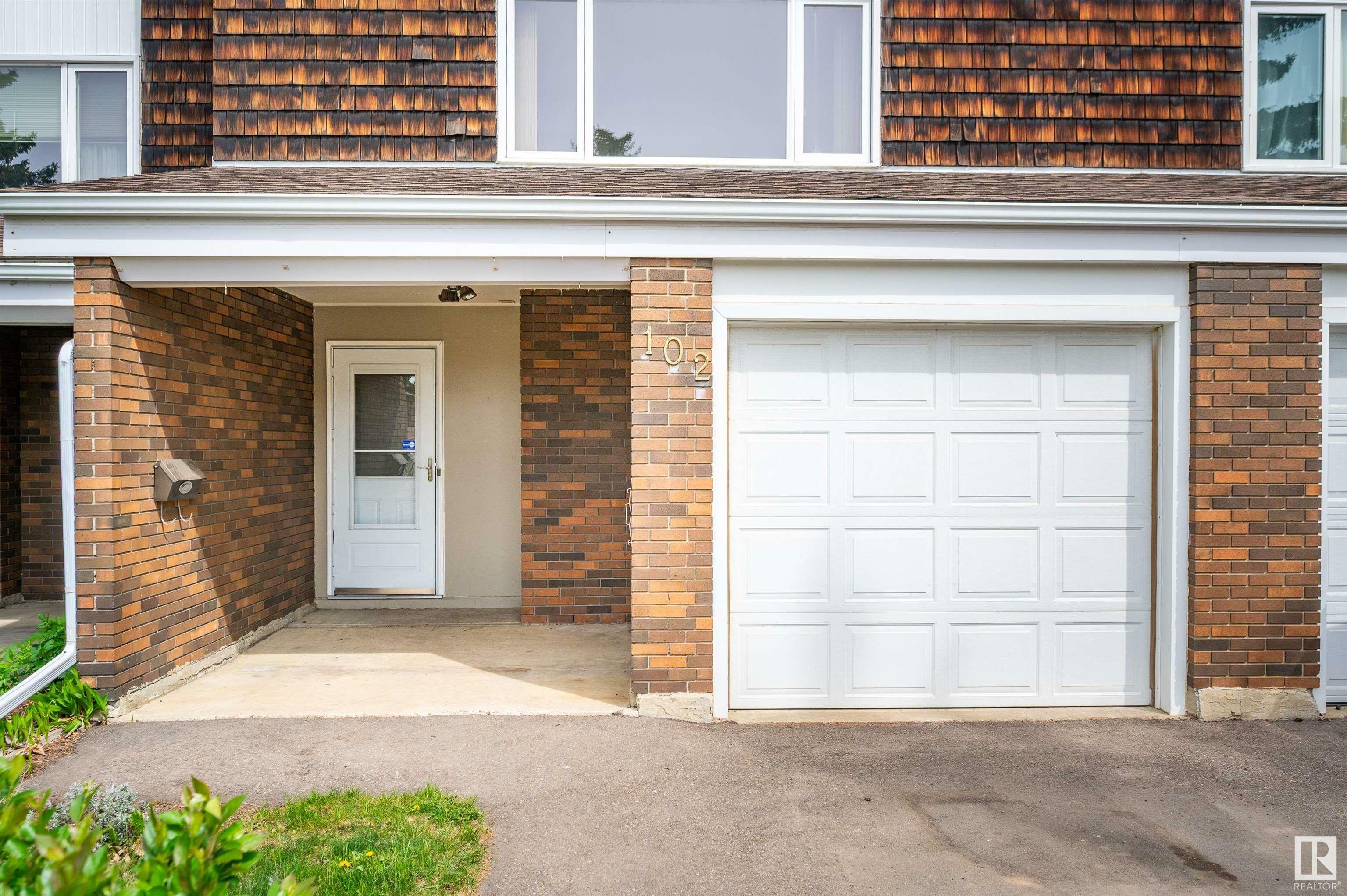 Property Photo: 102 Great Oaks AB T8A 0V8