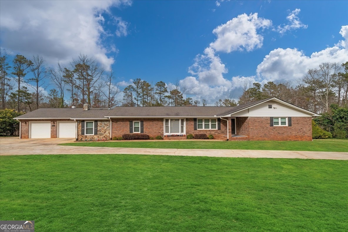 Property Photo:  2716 Georgia 16  GA 30116 