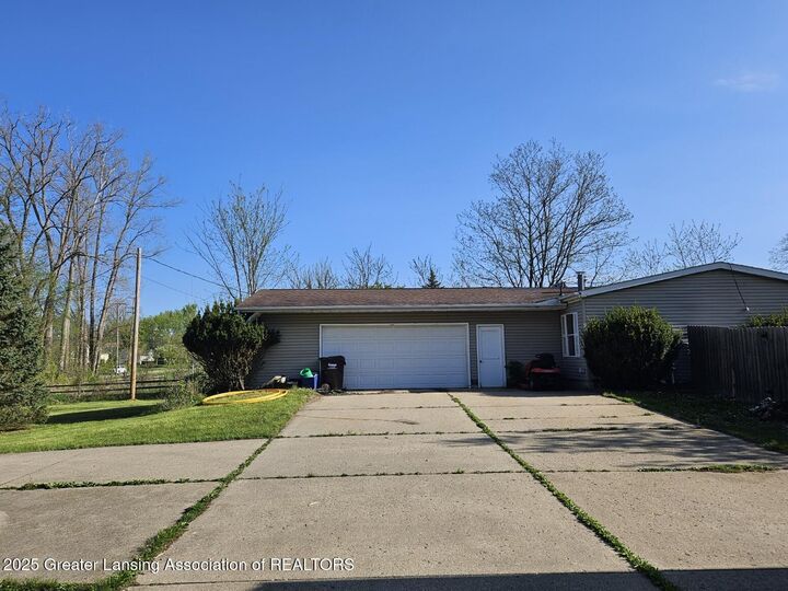 Property Photo:  6815 Aurelius Road  MI 48911 