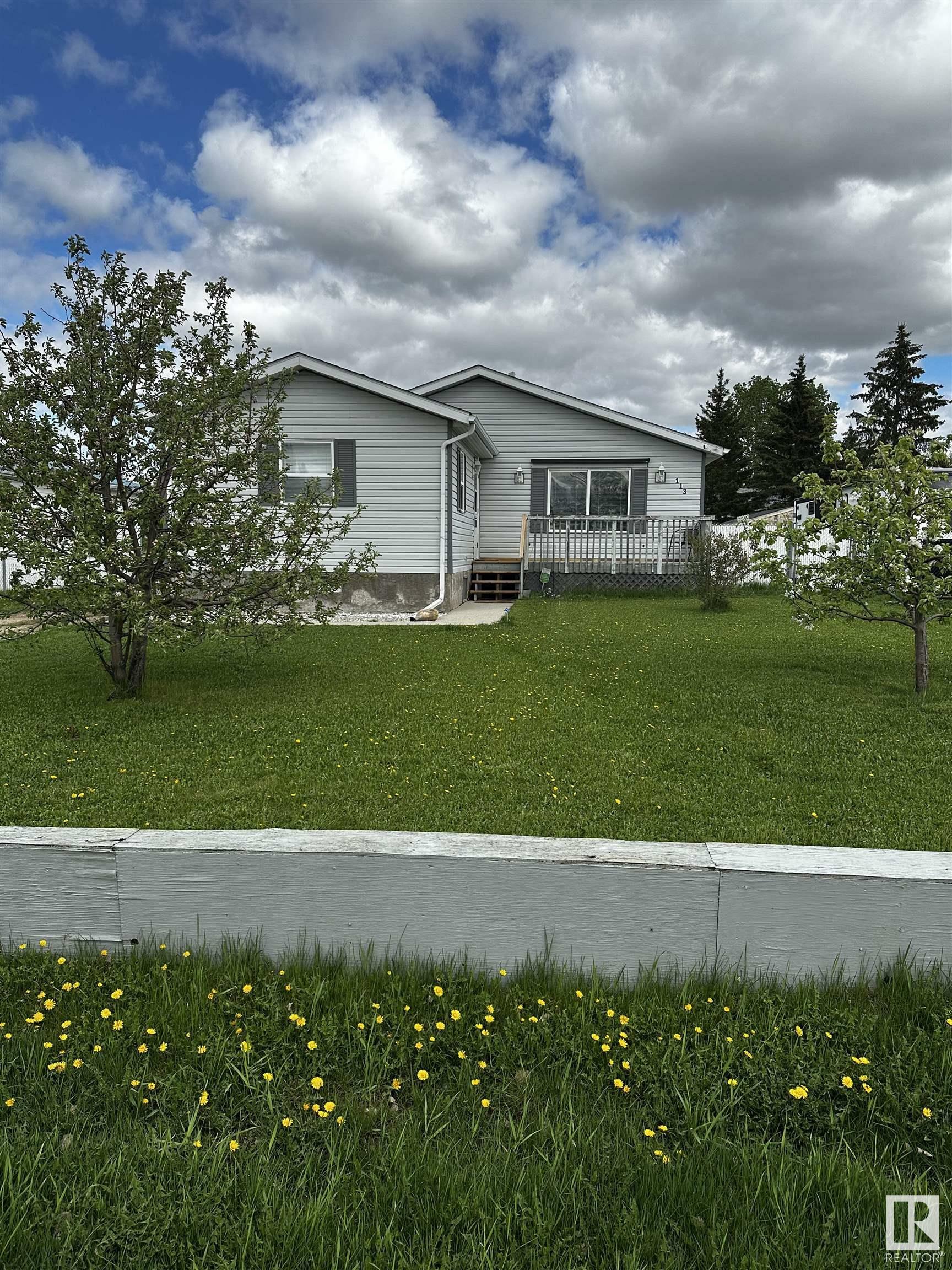 Property Photo: 113 Woodlands Drive AB T0C 2T0