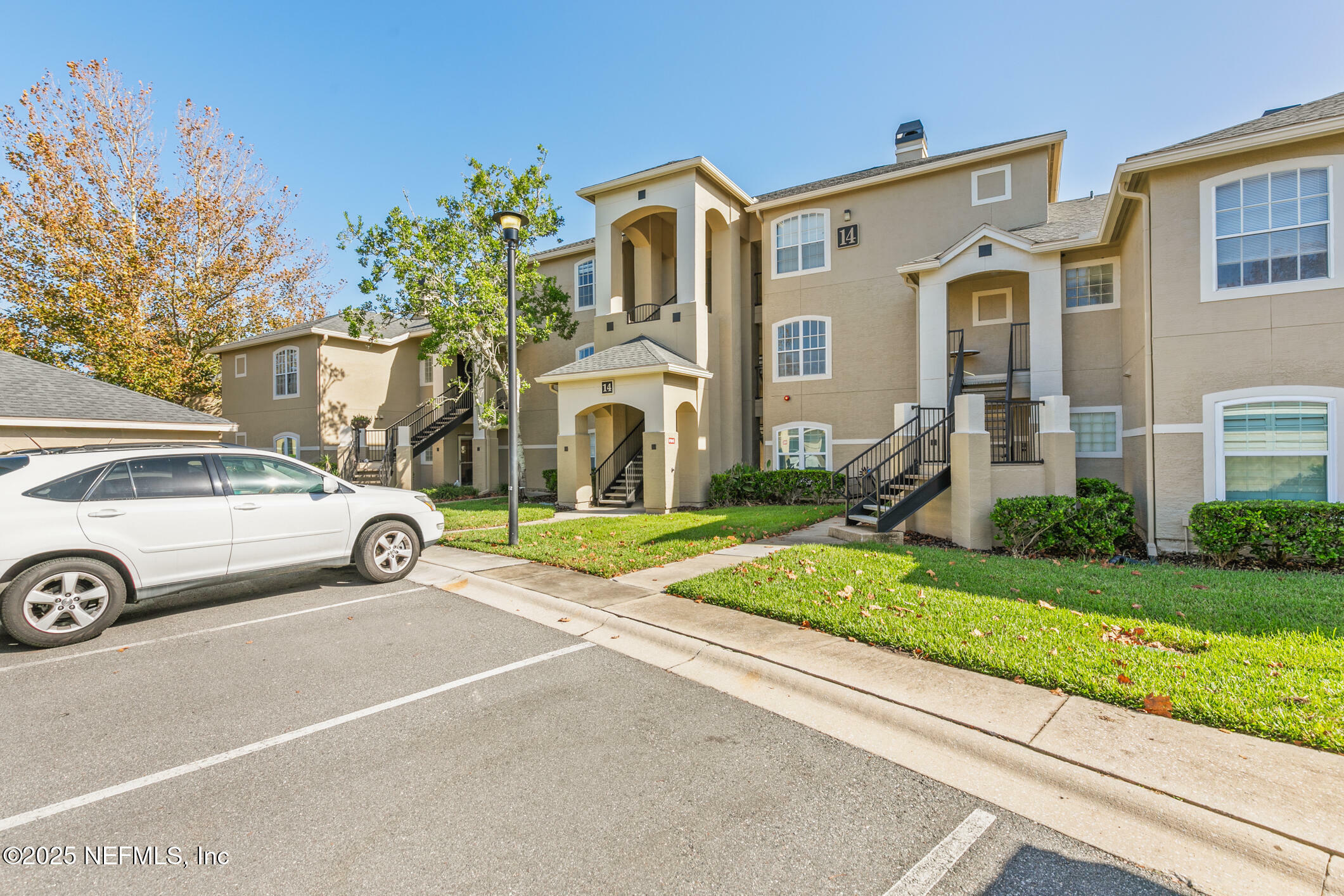 Property Photo: 1701 The Greens Way 1411 FL 32250