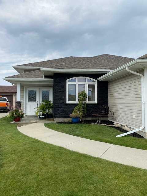 Property Photo: 10214 82 Street AB T8S 1N2