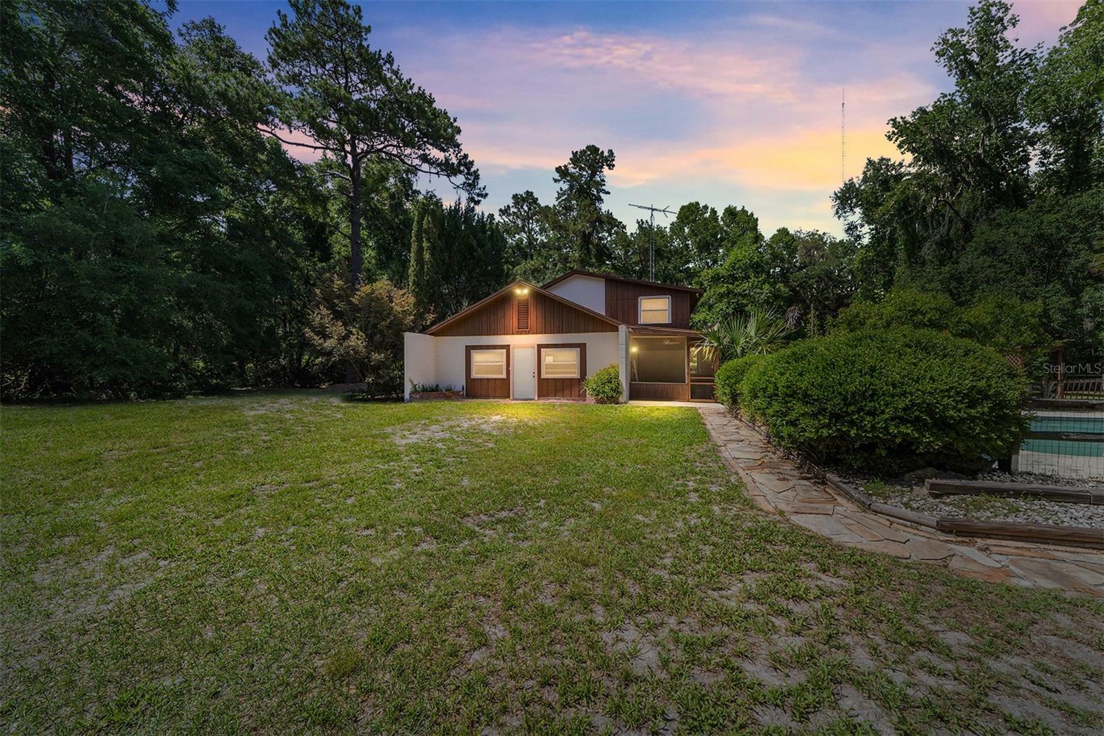 Property Photo: 13207 SW Williston Road FL 32667