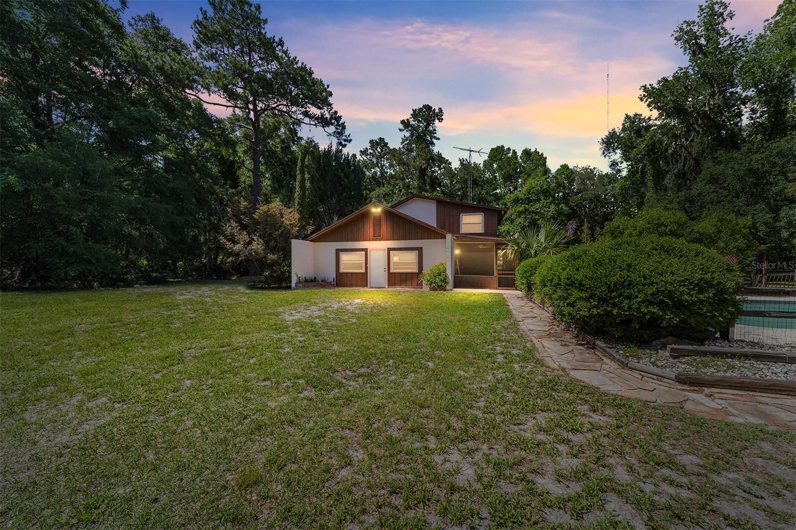 Property Photo:  13207 SW Williston Road  FL 32667 