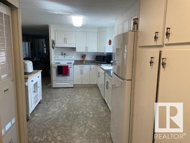 Property Photo: 43 Maple Ridge Drive NW AB T6P 1A9