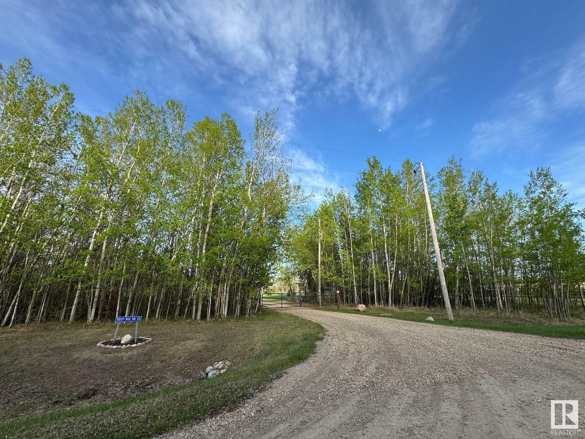 Property Photo: 50371 Rge Road 23 AB T0C 2P0