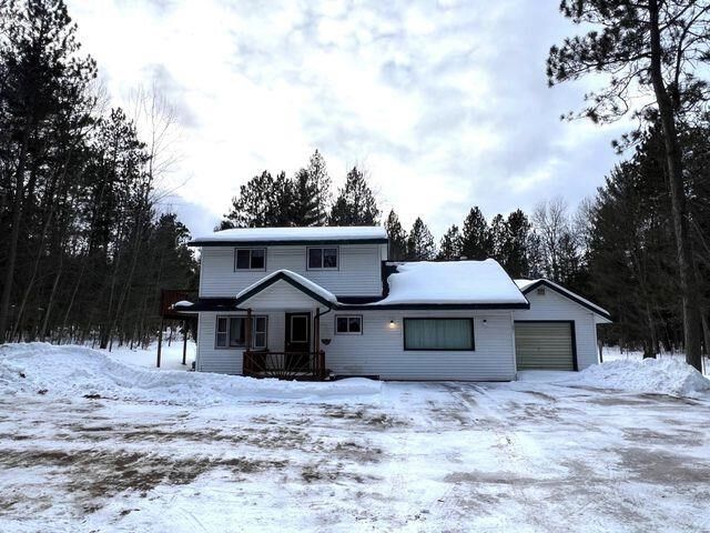 Property Photo: 1091 N M-33 MI 49721