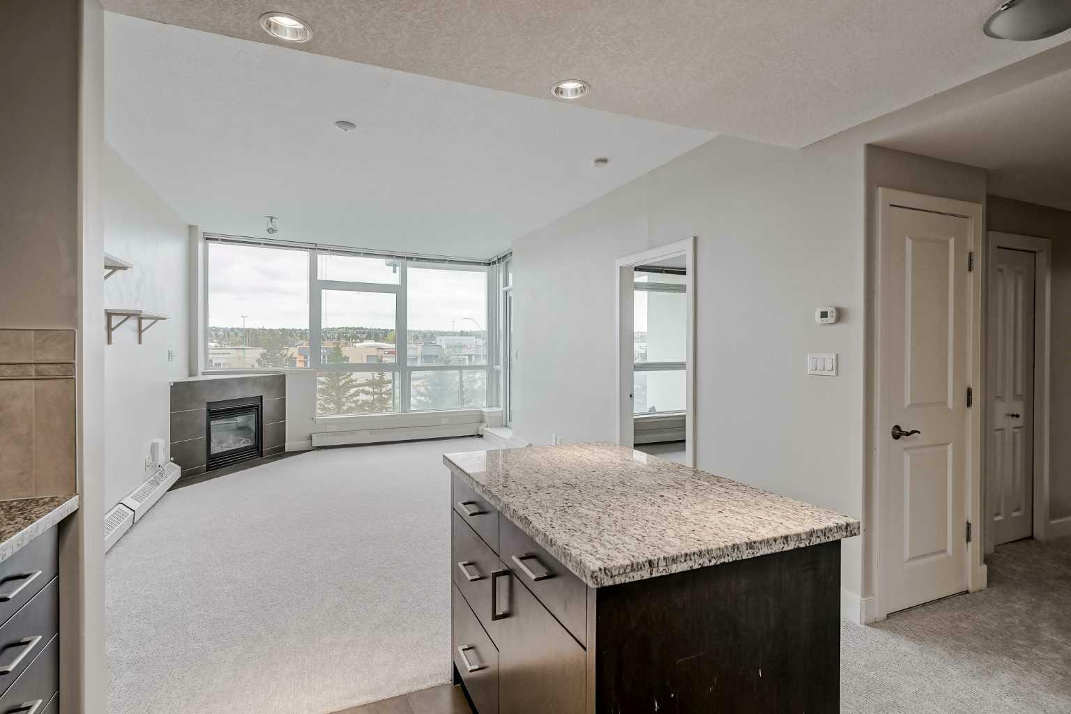Property Photo:  77 Spruce Place SW 405  AB T3C 3X6 
