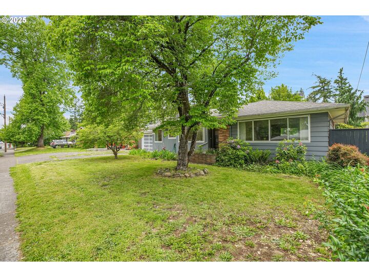 Property Photo:  12631 SE Market St  OR 97233 