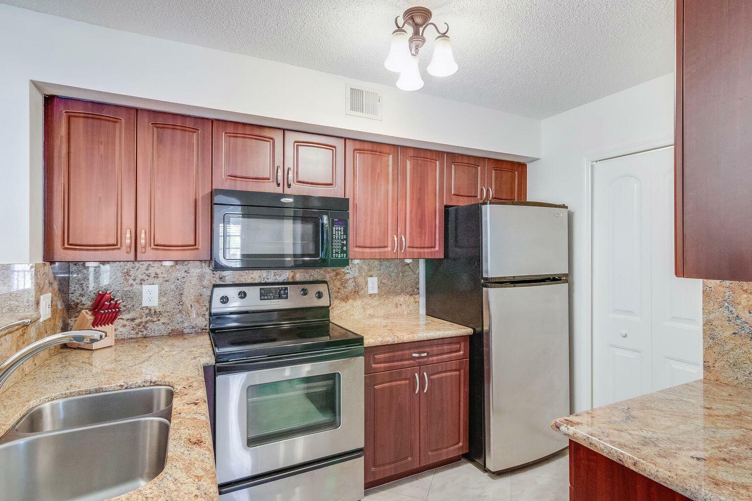 Property Photo:  1715 Village Boulevard 201  FL 33401 