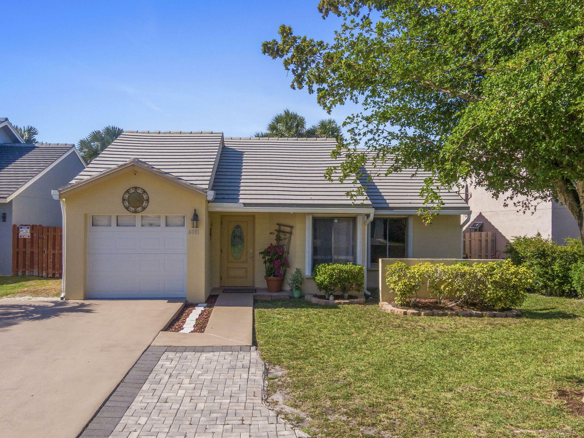 Property Photo:  6081 Strawberry Fields Way  FL 33463 