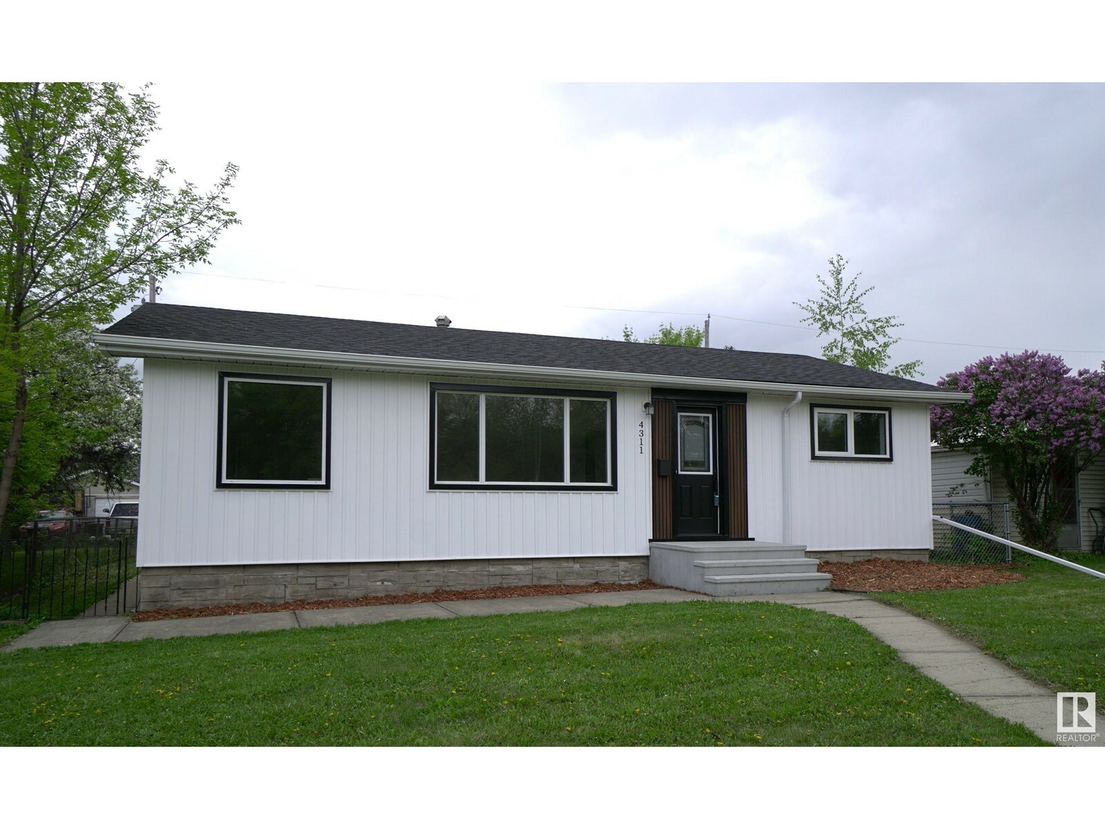 Property Photo: 4311 106 Av NW AB T6A 1E1