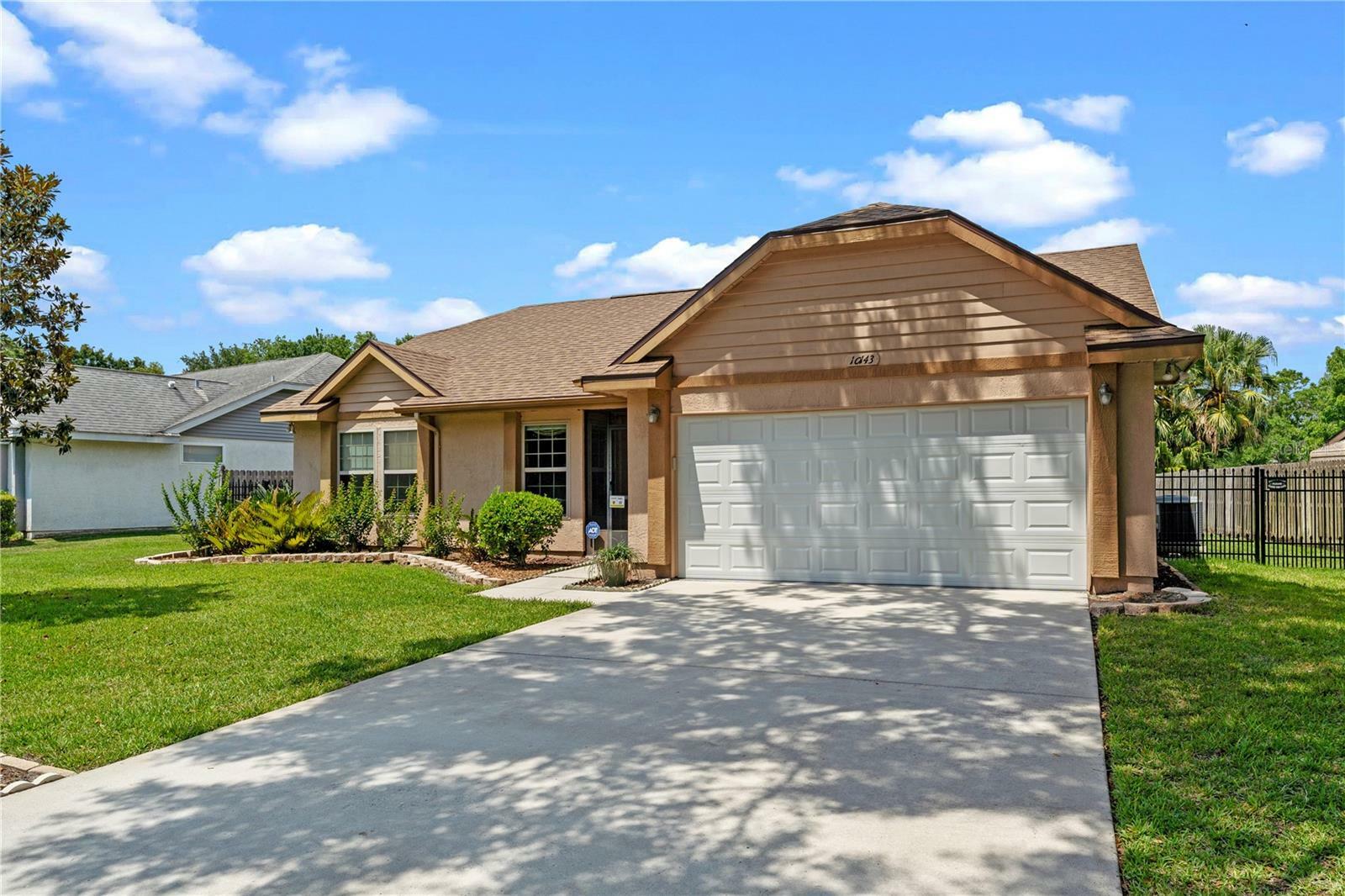 Property Photo: 10143 Pink Carnation Court FL 32825