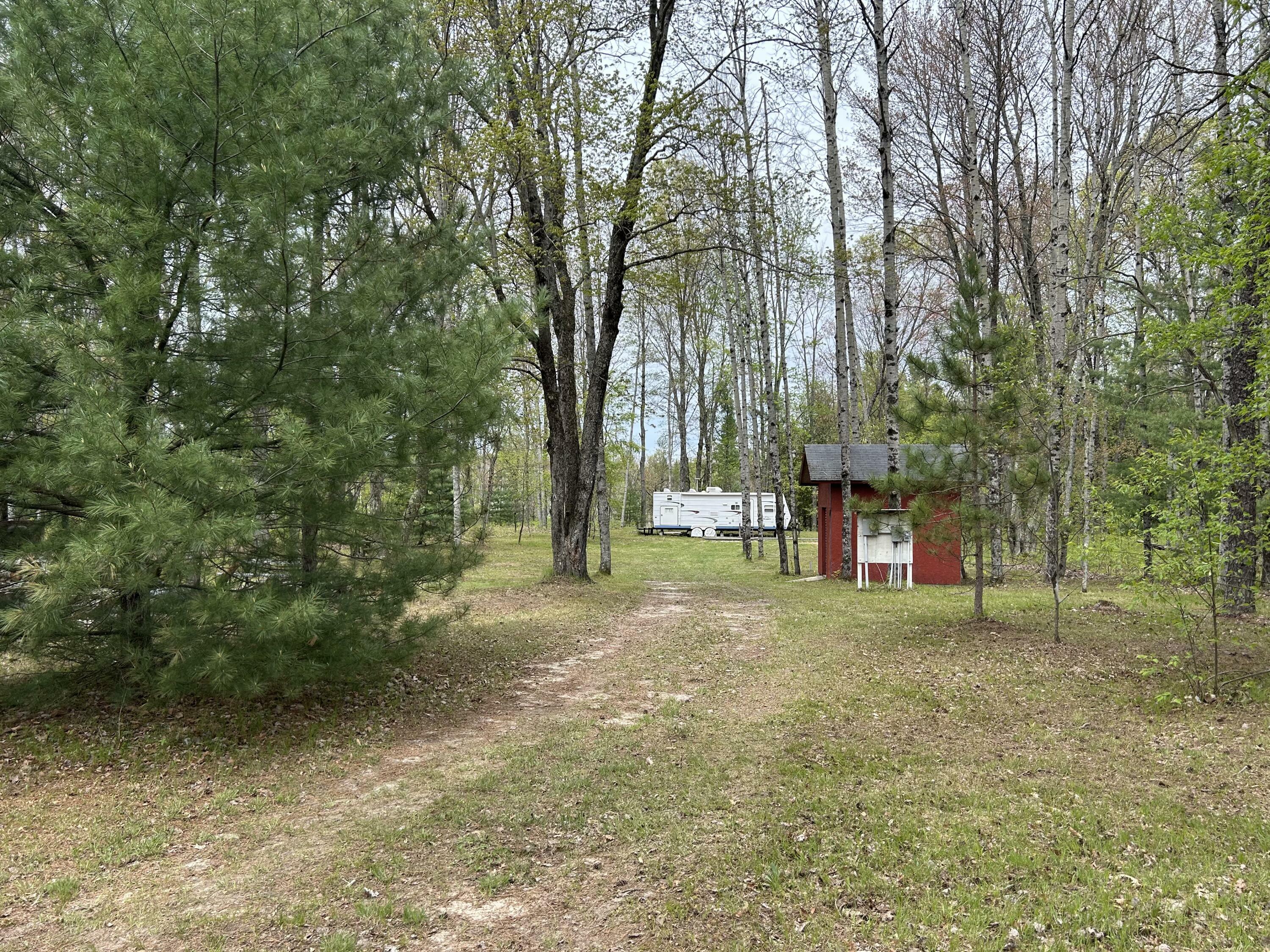 Property Photo:  722 W 4 Mile Road  MI 49656 