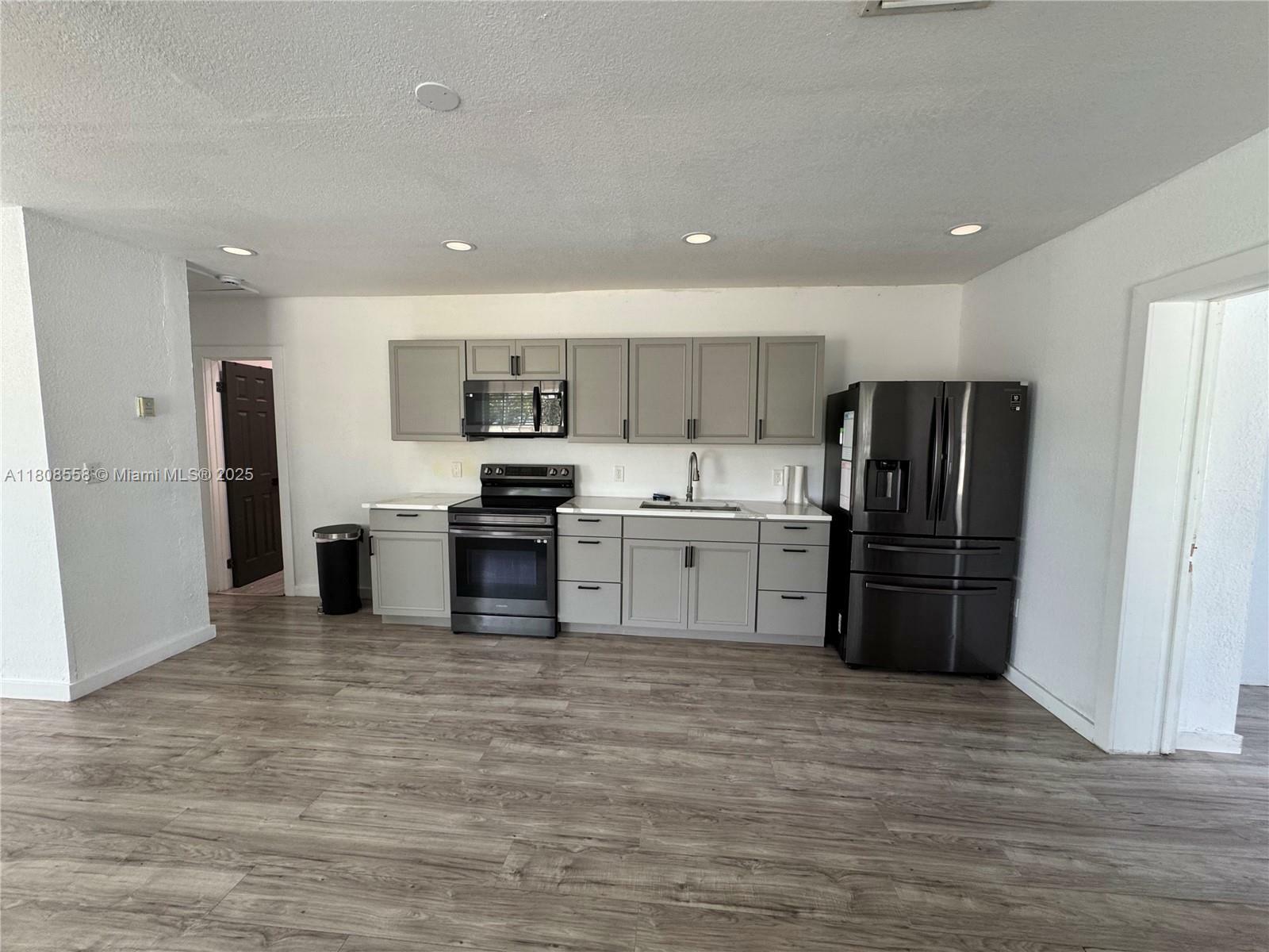 Property Photo: 1200 NW 87th St FL 33147