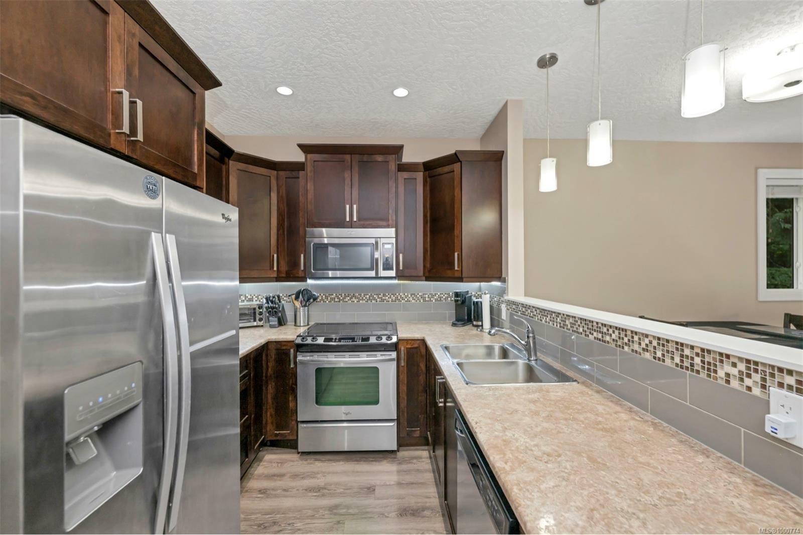 Property Photo:  6345 Ardea Pl 16  BC V9L 0E2 
