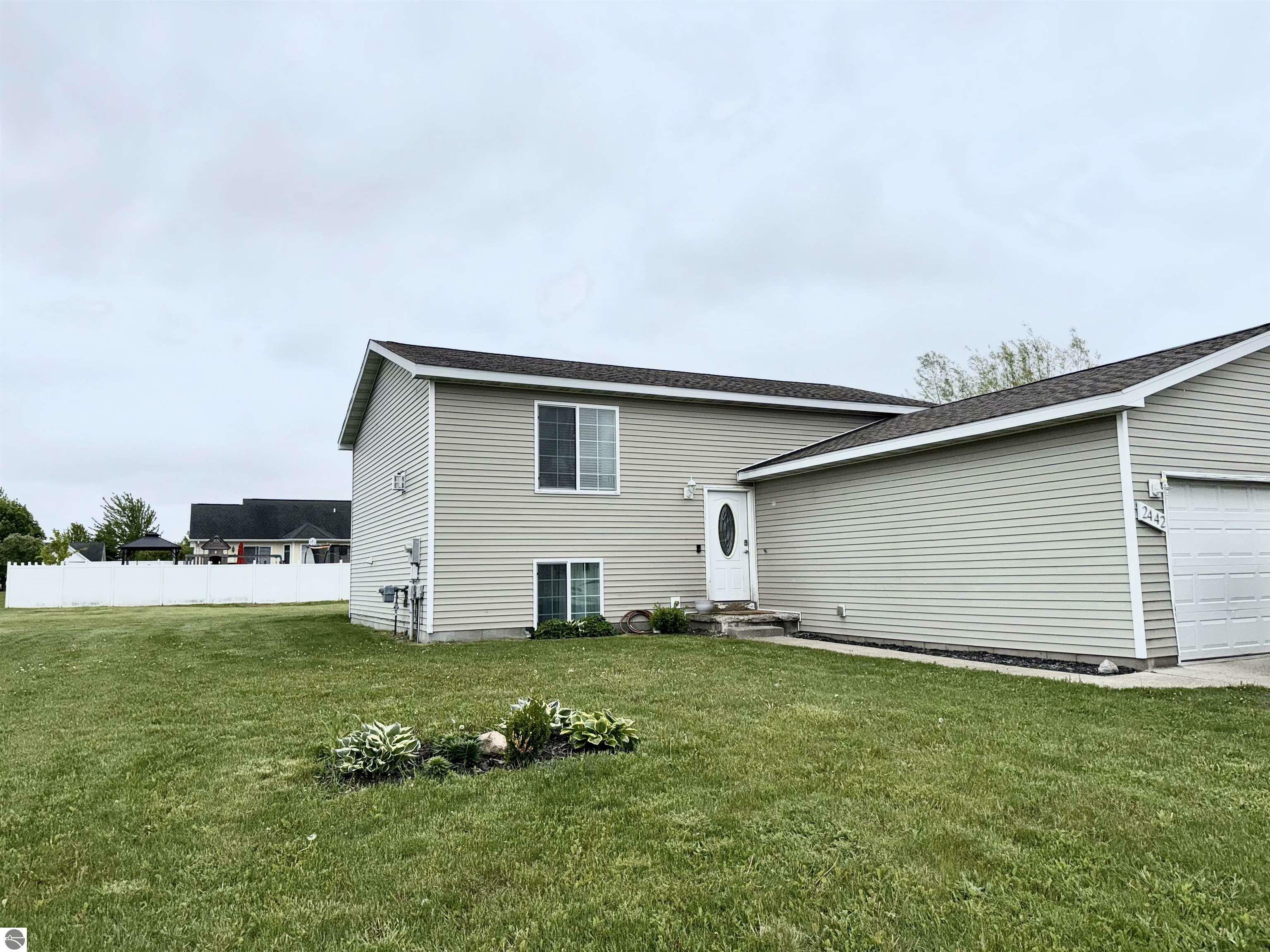 Property Photo:  2442 Joseph Drive  MI 48858 