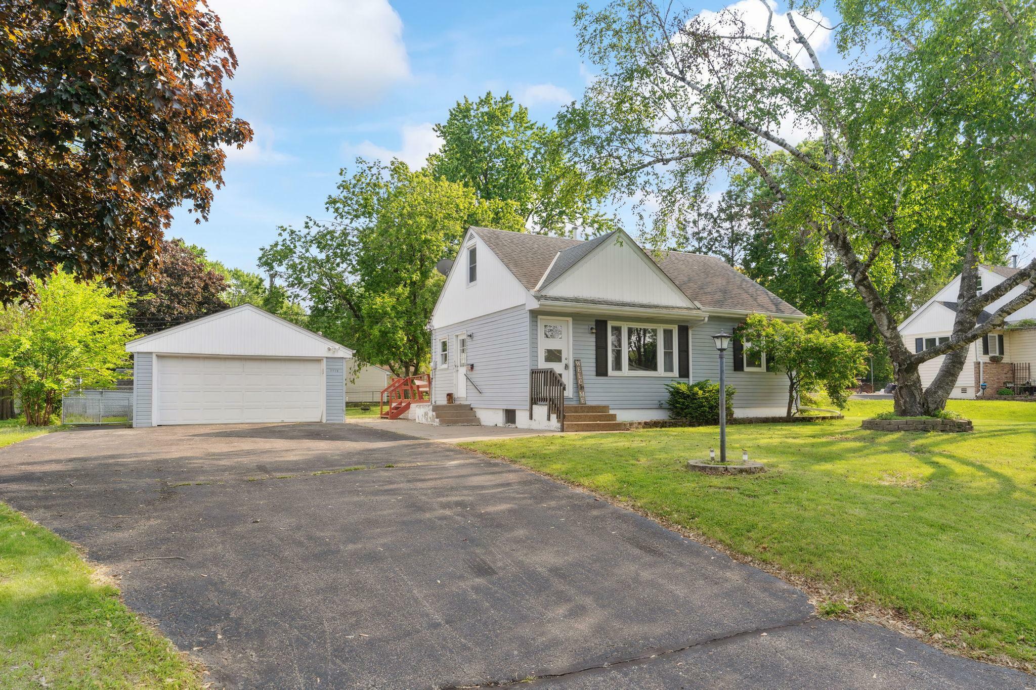 Property Photo: 7719 60th Avenue N MN 55428