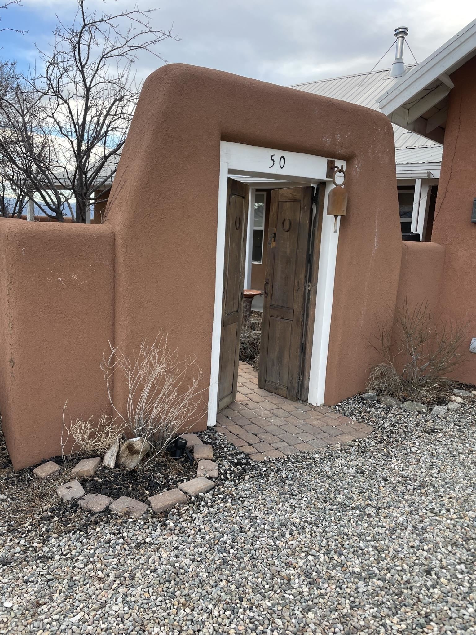 Property Photo:  50 Colonias Pointe  NM 87529 