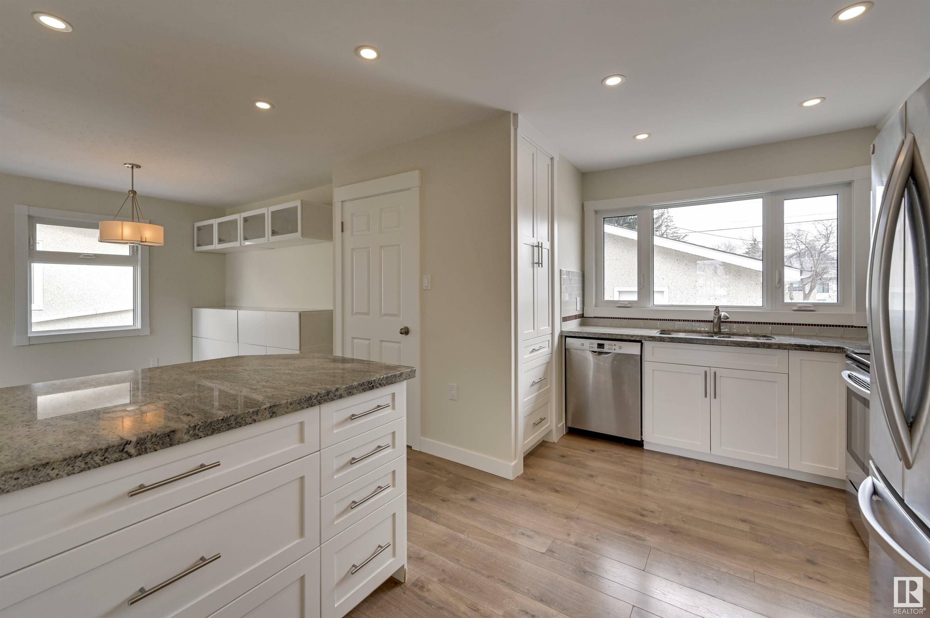 Property Photo: 5811 113B Street NW AB T6H 3J4