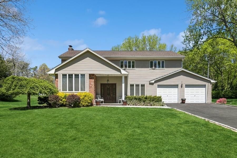 Property Photo:  30 Wintergreen Drive  NY 11747 