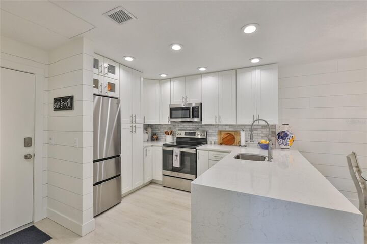 Property Photo: 230 Medallion Boulevard F FL 33708
