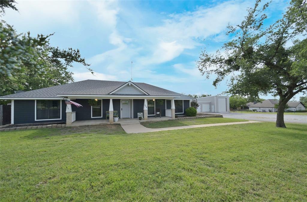 Property Photo: 228 County Road 3385 TX 76073