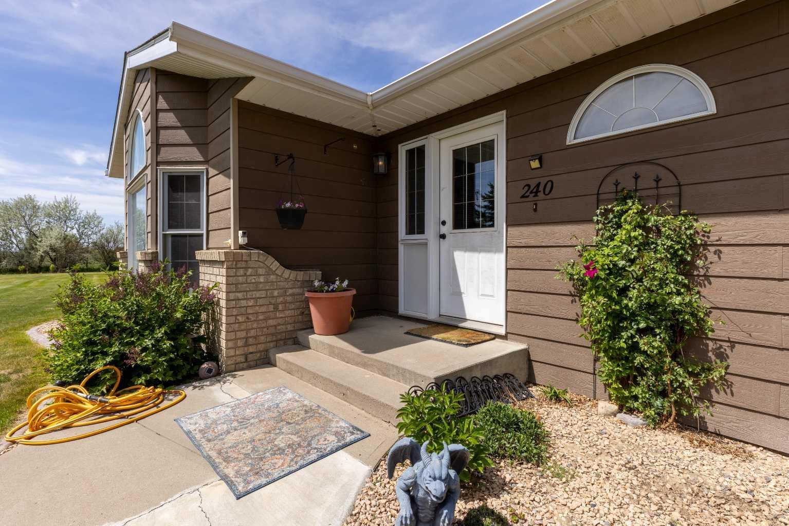 Property Photo: 240 Harris Road AB T1G 2E4