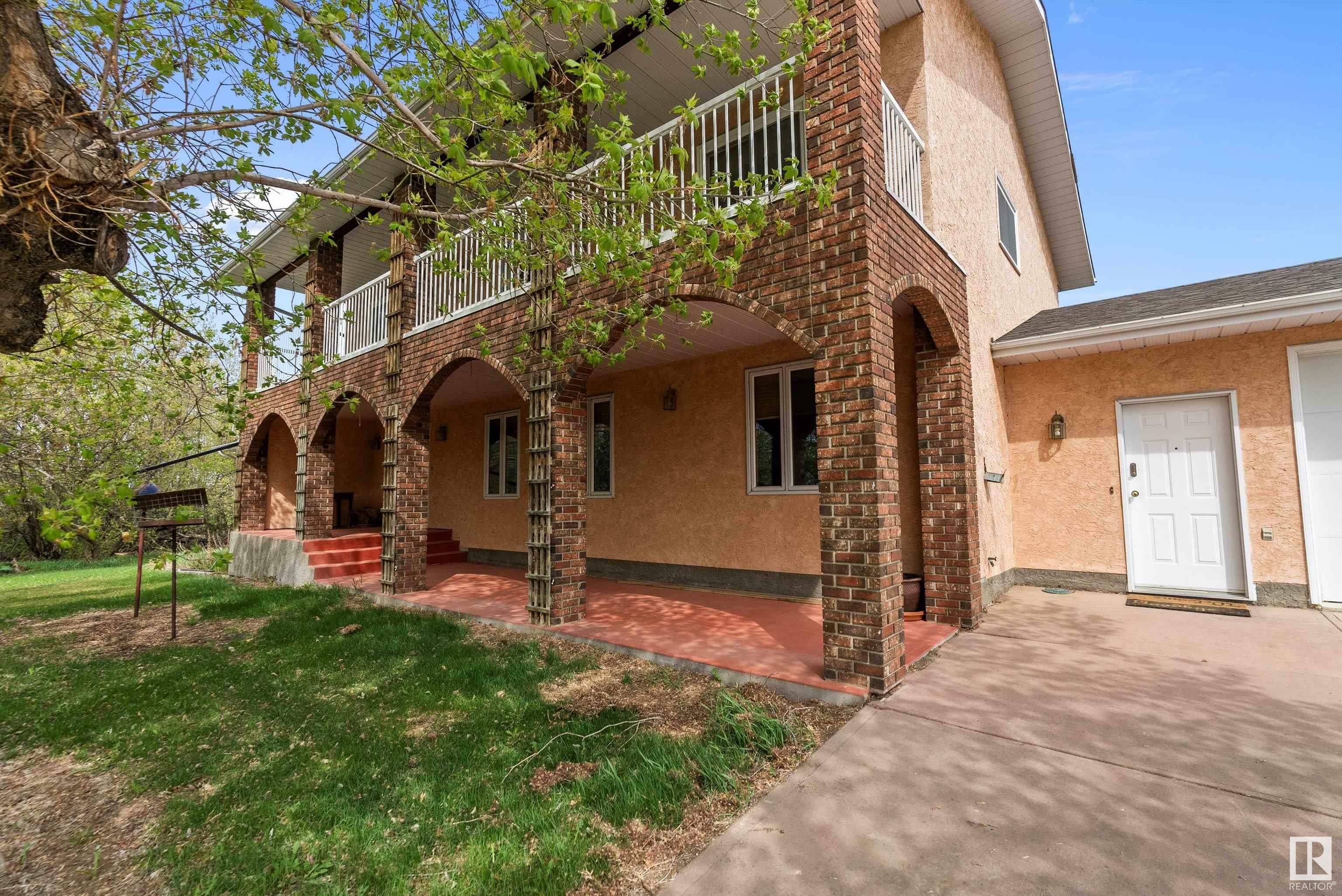 Property Photo: 240028 Twp 460 AB T9A 1X1