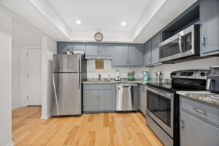 Property Photo:  128 Carriage Way Drive 116B  IL 60527 