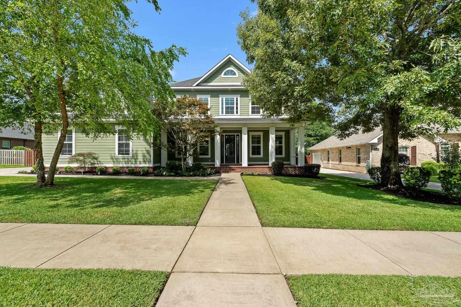 Property Photo: 8817 Marsh Elder Dr FL 32526