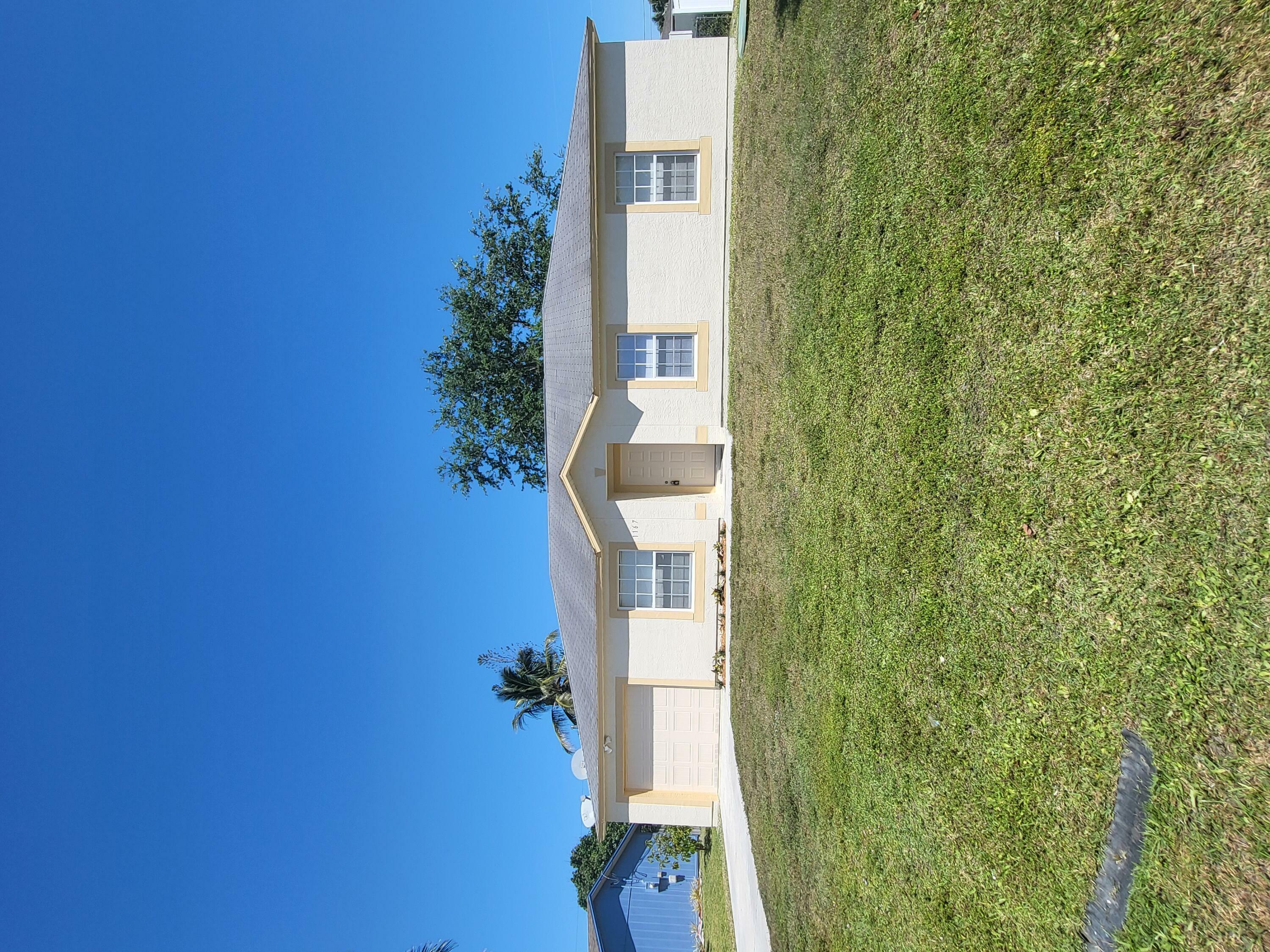 Property Photo: 1167 SW Curtis Street FL 34983