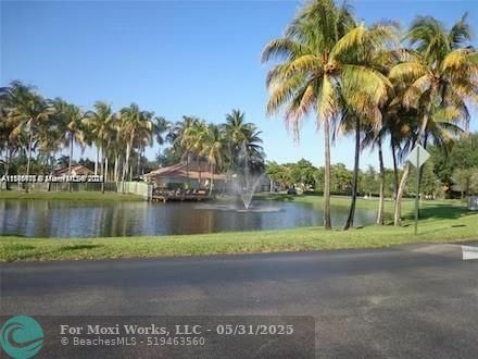 Property Photo:  651 Lyons Rd 10-106  FL 33063 