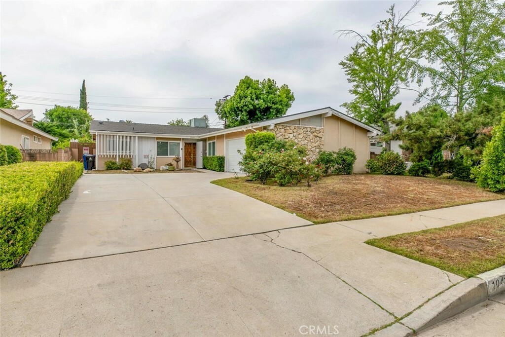 Property Photo:  10415 Wish Avenue  CA 91344 
