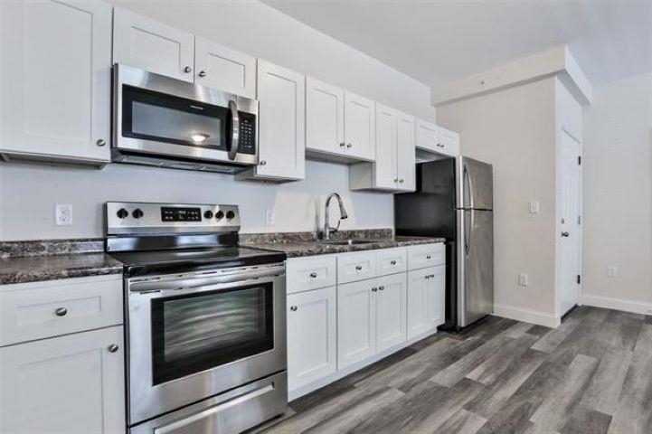 Property Photo:  165-1 W Hancock Street  NH 03104 