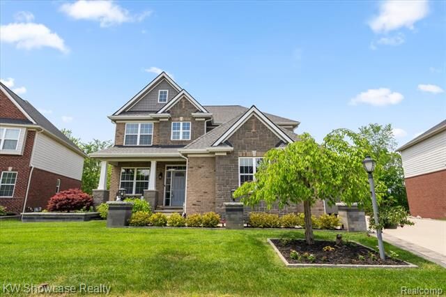 Property Photo:  41775 Steinbeck Glen  MI 48377 