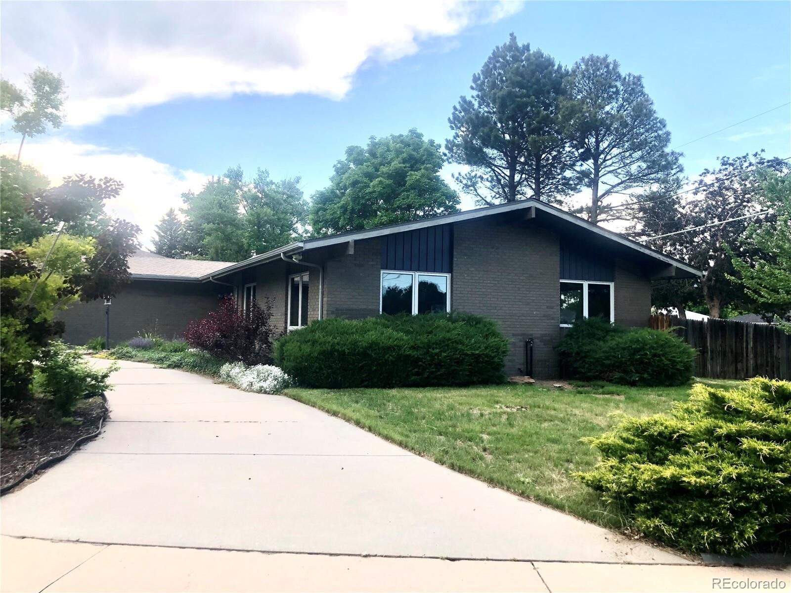 Property Photo:  3001 S Vine Street  CO 80210 