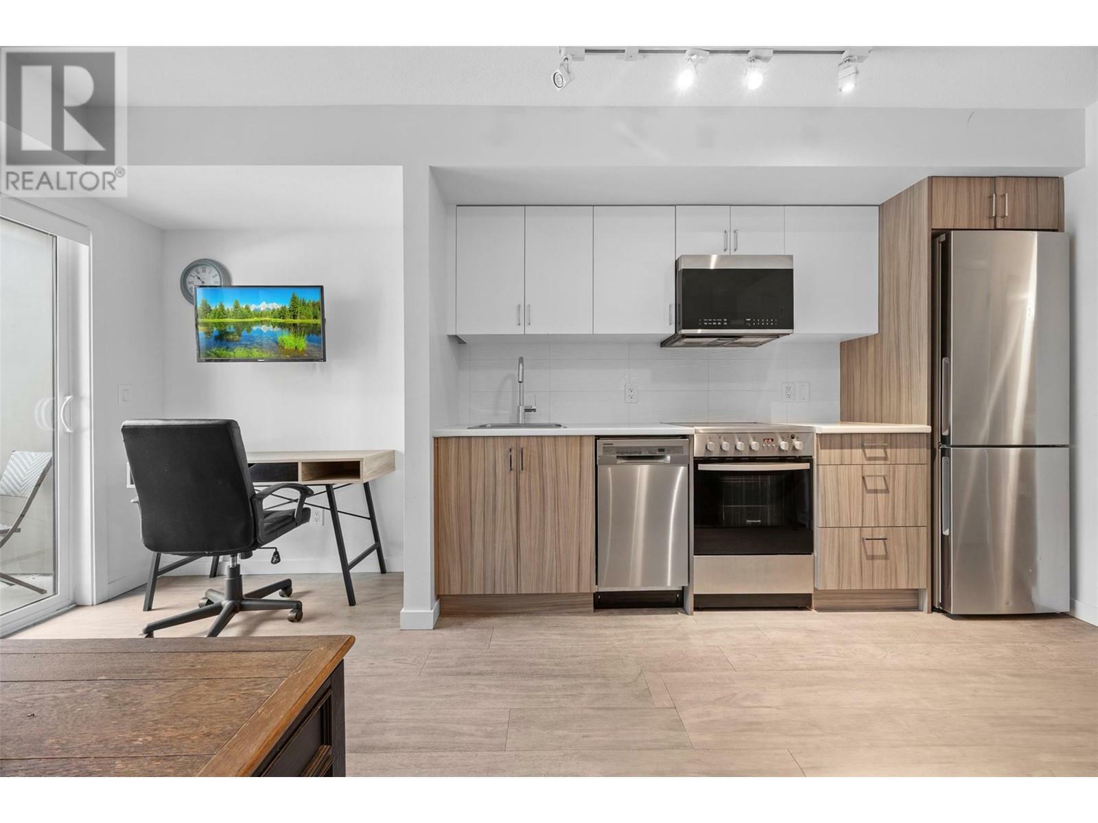 Property Photo: 625 Academy Way 103 BC V1V 0E3