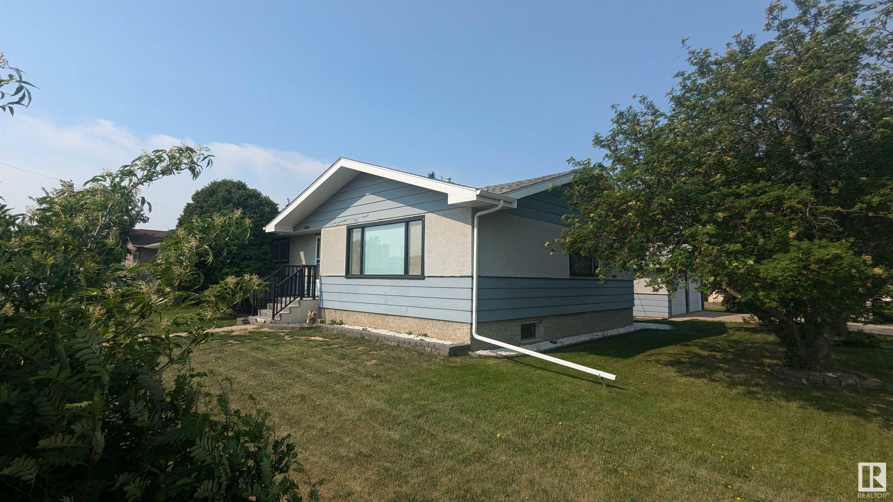Property Photo: 5466 45 Street AB T9C 1C9