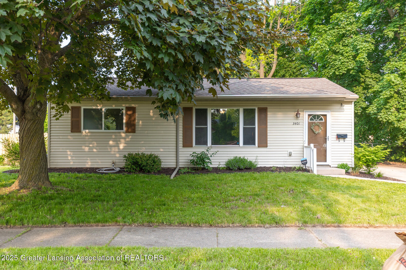 Property Photo:  3401 Churchill Avenue  MI 48911 