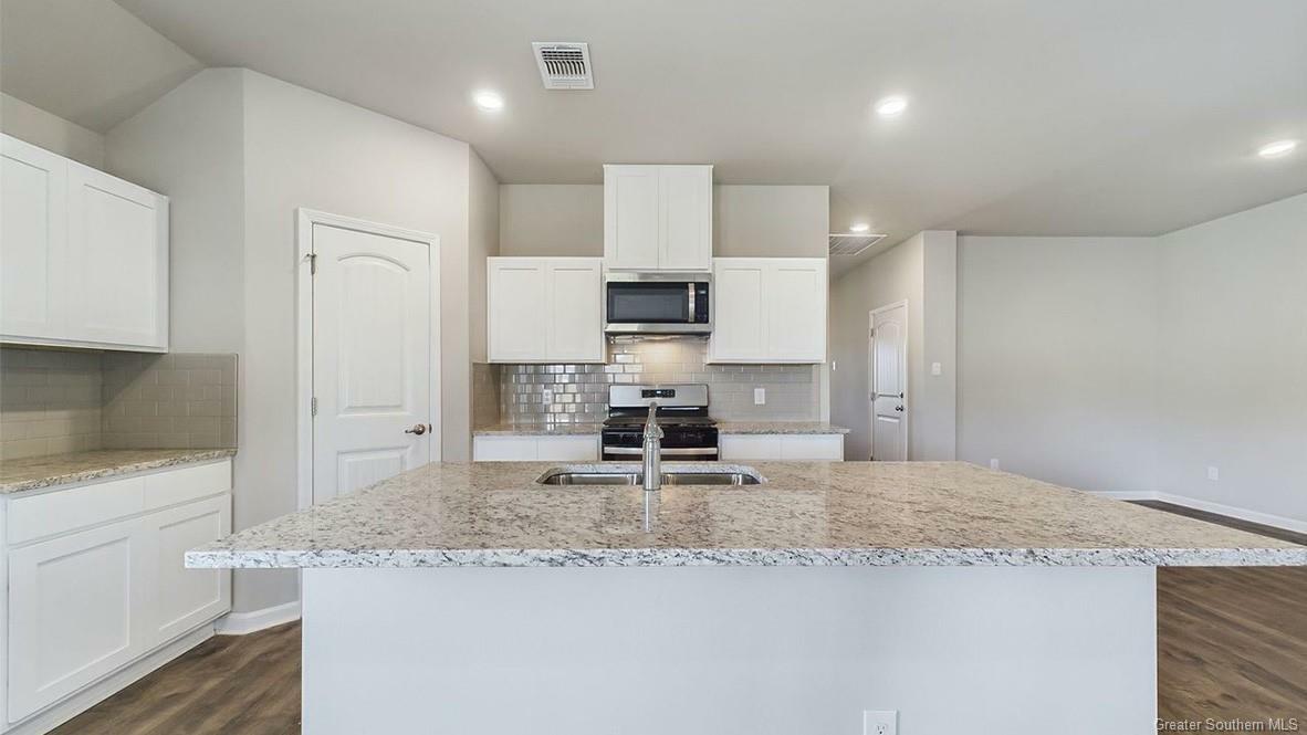 Property Photo: 4751 Firefly Court LA 70607