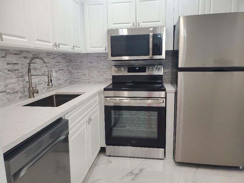 Property Photo:  242 Tilford L  FL 33442 