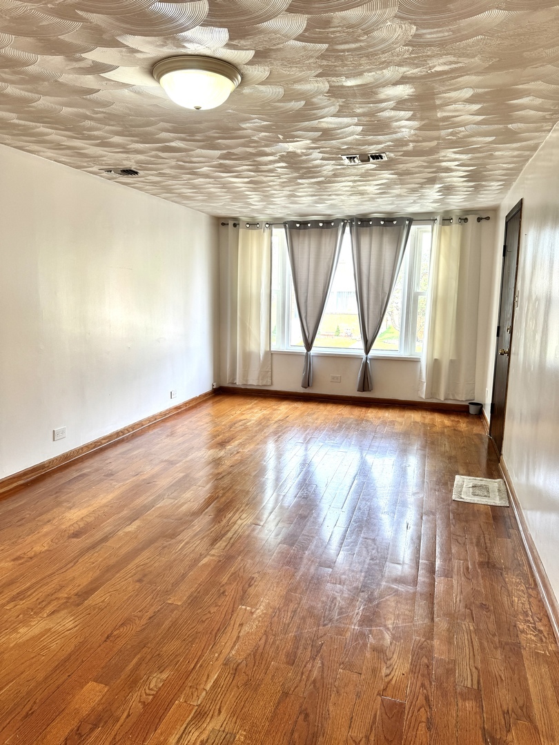 Property Photo: 2327 N 75th Avenue 1 IL 60707